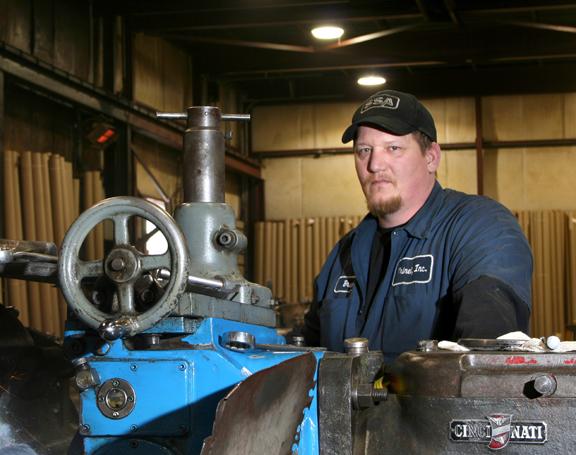 A worker pauses during a shift in a Cincinnati warehouse