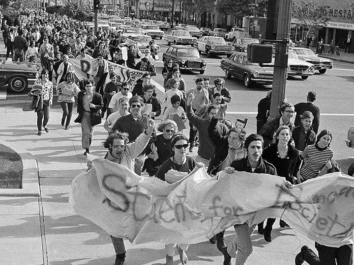 Members of SDS lead a demonstration against the Vietnam War