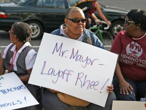 Teachers and their supporters rallied against Michelle Rhee's announcement of hundreds of layoffs