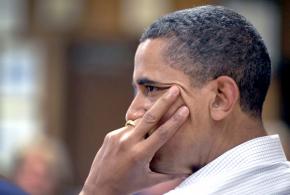 President Obama listens to a report on the impact of the BP oil spill on the Gulf Coast