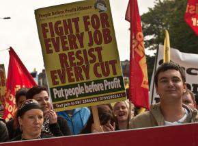 Protesters in Dublin march against the government's plan for deep cuts in public services